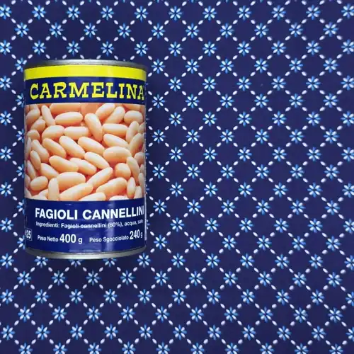 Carmelina Cannellini Beans. Made in Italy. Can made without BPA. 60% cannellini beans. Salted. Fagioli cannellini. Available from Coles. Protein 7.7g per 100g. Sodium 245mg per 100g.