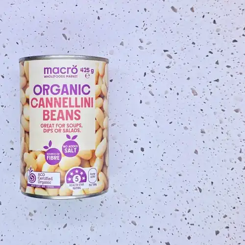 Macro Wholefoods Market Organic Cannellini Beans. 5 Health star rating. No added salt. Source of fibre. ACO certified organic. Packed in Italy from imported ingredients. Available from Woolworths. 60% cannellini beans. Protein 6.5g per 100g. Sodium 24mg per 100g.
