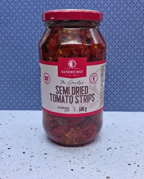 Sandhurst The Family's Semi Dried Tomato Strips. EST. 1988. Julienne cut. Gluten fee. Family owned for two generations.