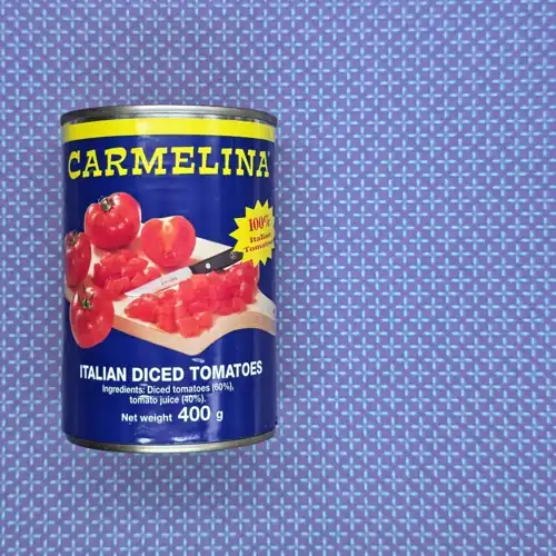 Carmelina Italian Diced Tomatoes. 100% Italian tomatoes. 60% tomatoes. Product of Italy. Available from Coles. Sugars 3.9g per 100g. Sodium 10mg per 100g.