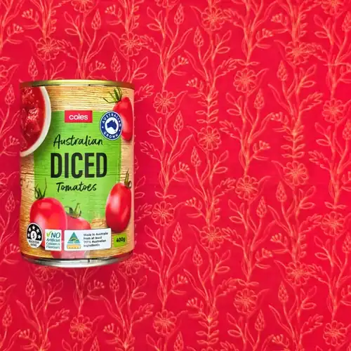 Coles Australian Diced Tomatoes. 5 Health star rating. Australian grown. No artificial colours & flavours. 60% tomatoes. Available from Coles. Sugars 4.2g per 100g. Sodium 20mg per 100g.