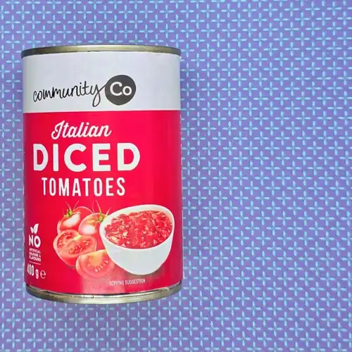 Community Co Italian Diced Tomatoes. No artificial colours and flavours. Made in Italy.