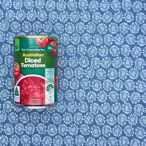 Woolworths Australian Diced  Tomatoes. 4.5 Health star rating. Part of your daily five. 60% tomatoes. Available from Woolworths. Sugars 4.2g per 100g. Sodium 20mg per 100g.