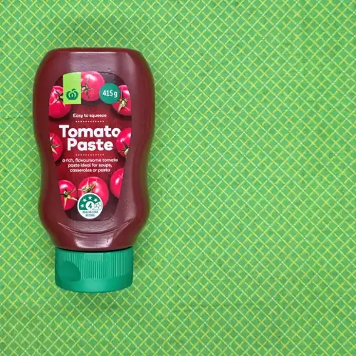 Woolworths Tomato Paste. 4 Health Star Rating. Easy to squeeze. Made in China. 99% tomatoes. Sugars 8.8g per 100g. Sodium 463mg per 100g.